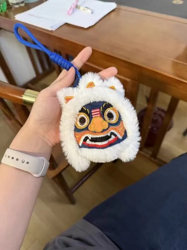 Tiger opera-mask plush coin purse keychain with appliqué detail