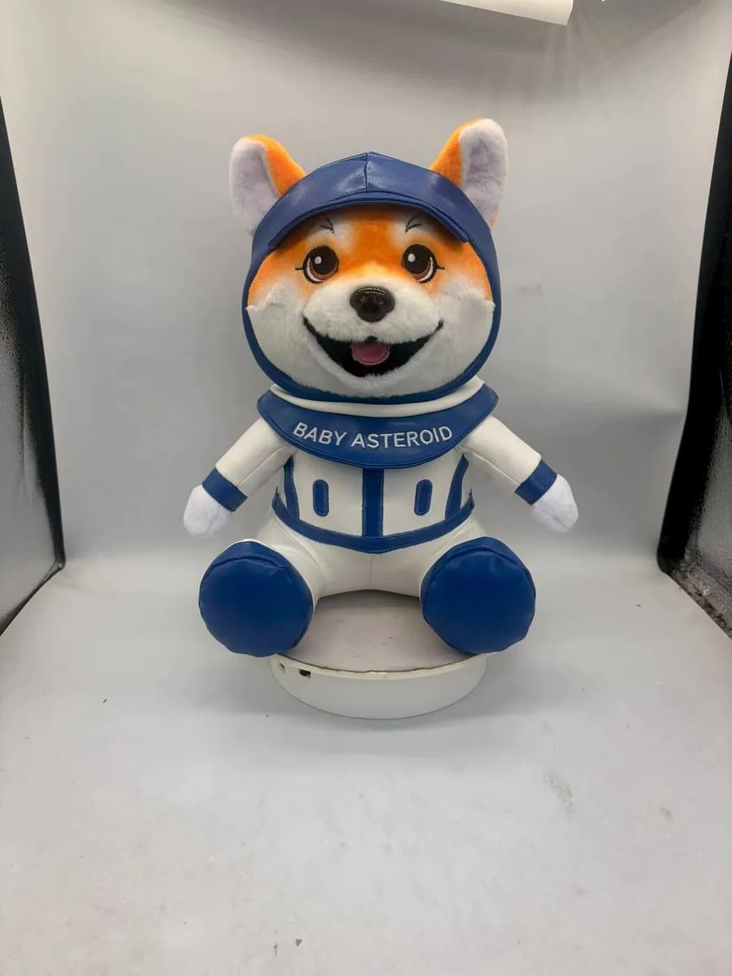 Custom shiba dog mascot plush in a printed astronaut suit and helmet